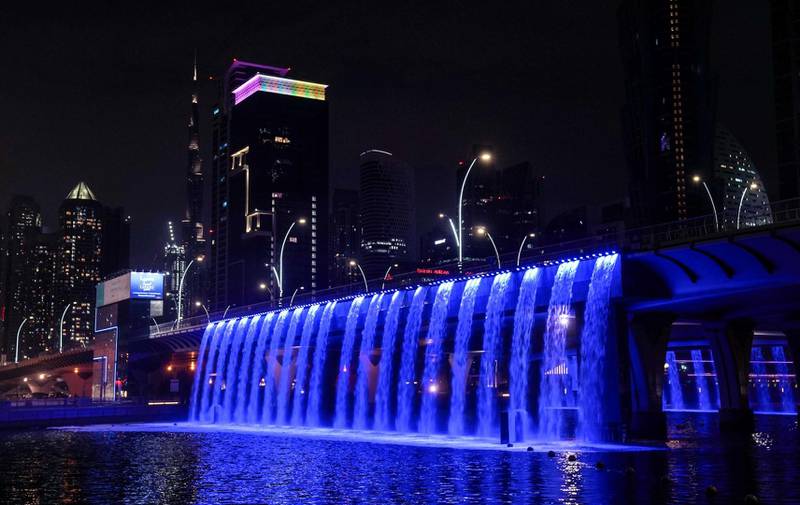 The waterfall over Dubai Water Canal lights up blue in support of Autism Awareness Month. Now Enoc and the RTA are showing their support for the campaign. Courtesy, WAM
