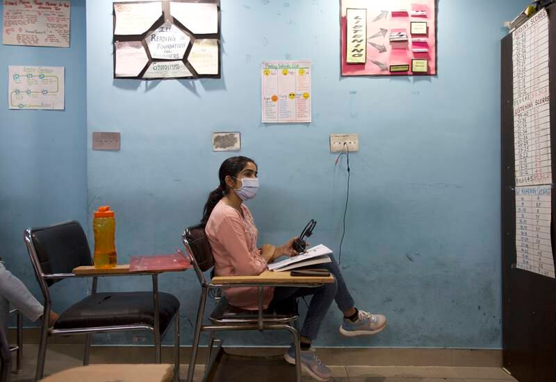 Ranjit Kaur,25, is a microbiologist and works at a hospital in Jalandhar. She takes English classes to prepare for mandatory language exams required to be accepted for higher studies in the West. Taniya Dutta for The National 