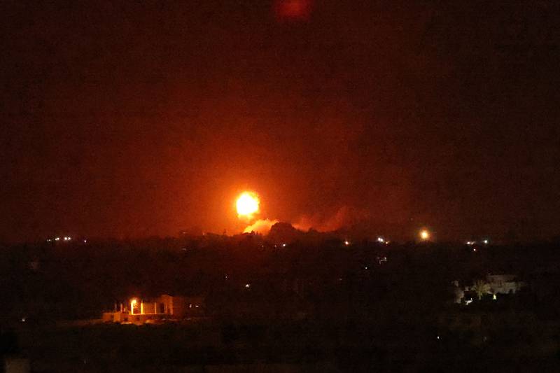 A fireball rises following an air strike in Khan Yunis in the southern Gaza Strip on August 23. AFP