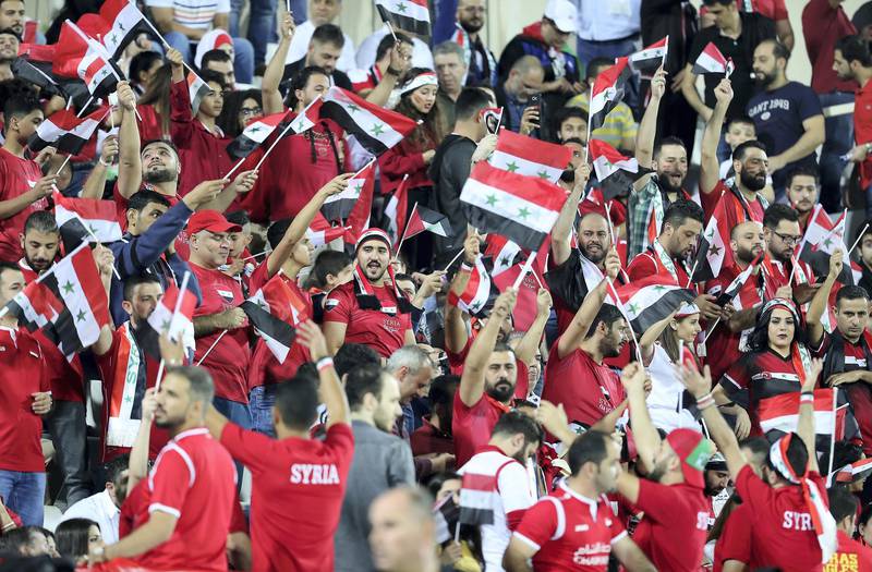 SHARJAH , UNITED ARAB EMIRATES , January  6 ��� 2019 :-  Syrian fans before the start of AFC Asian Cup UAE 2019 football match between Syria vs Palestine held at Sharjah Football Stadium in Sharjah. ( Pawan Singh / The National ) For News/Sports/ Big Picture