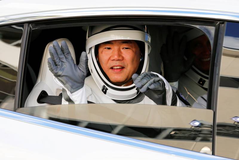 Japan Aerospace Exploration Agency (JAXA) astronaut Soichi Noguchi gestures as the crew of a SpaceX Falcon 9 rocket departs for the launch pad for the first operational NASA commercial crew mission at Kennedy Space Centre in Cape Canaveral, Florida, US. Reuters