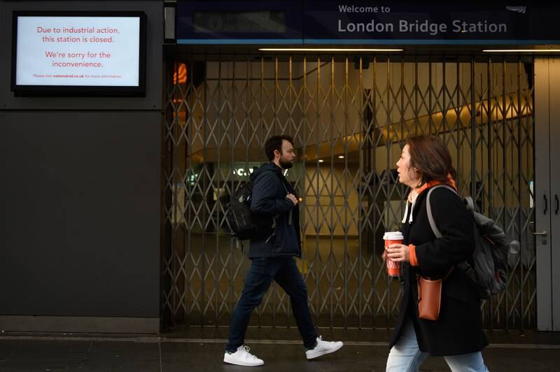 A sign alerts travellers to the closure of London Bridge station during the morning rush hour. Getty Images
