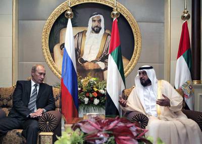 Sheikh Khalifa bin Zayed Al Nahayan (R) and Russian President Vladimir Putin (L) engage in talks at the Mushrif Palace in Abu Dhabi. Putin is accompanied on the trip by the director of arms exporter Rosoboronexport, as well as those of the airline Aeroflot and space agency Roskosmos.        AFP PHOTO / RIA NOVOSTI / KREMLIN POOL / DMITRY ASTAKHOV (Photo by DMITRY ASTAKHOV / POOL / AFP)