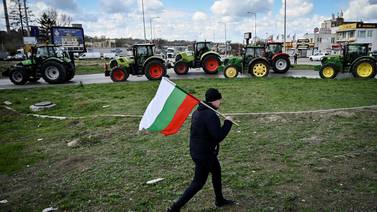 A Bulgarian farmer at a protest to stop trucks carrying Ukrainian grain from crossing the Danube Bridge between Bulgaria and Romania. AFP
