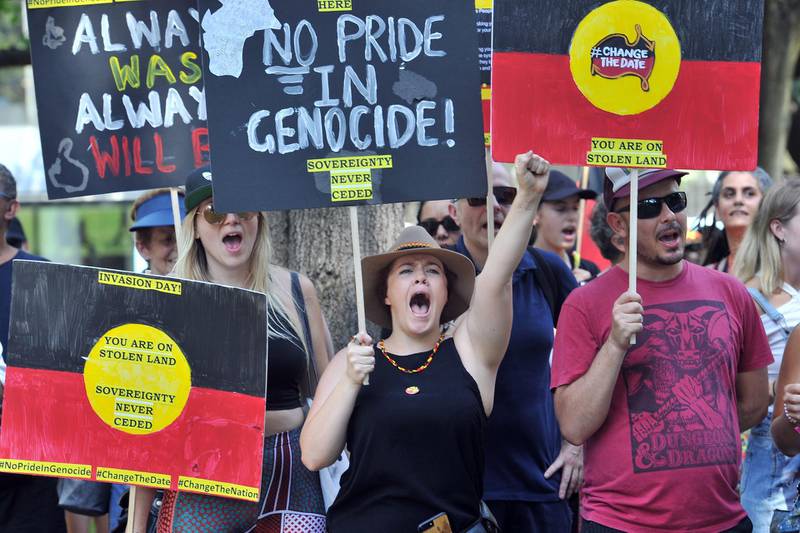 Protesters shouts slogans as they march through the streets of Sydney. AFP