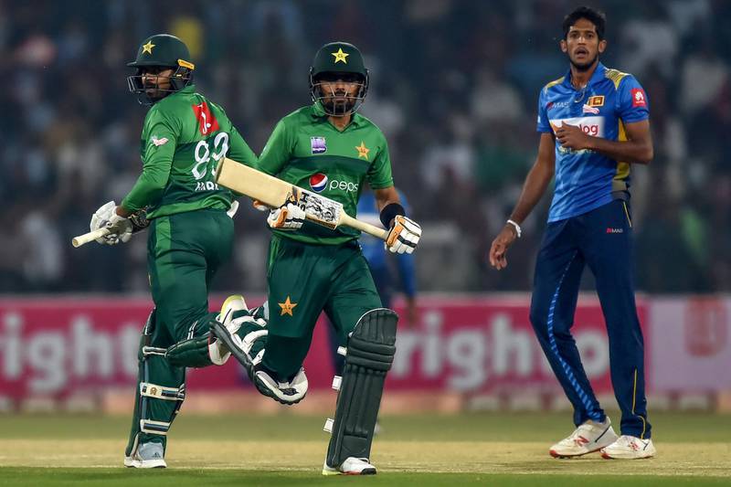 Babar Azam, centre, is the top T20 batsman in the world but no team went for him in the draft. AFP