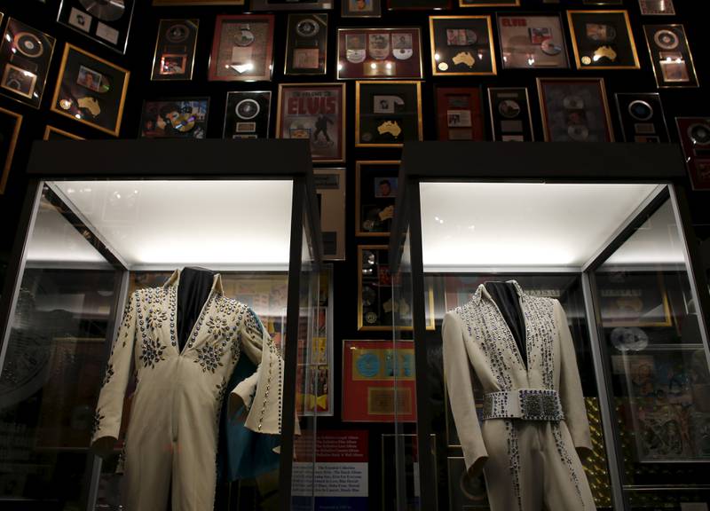 Items from Elvis Presley's former wardrobe are displayed at Graceland. Reuters