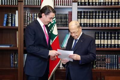 Lebanese President Michel Aoun, right, and US senior adviser for energy security Amos Hochstein with a letter of agreement over the maritime deal. EPA