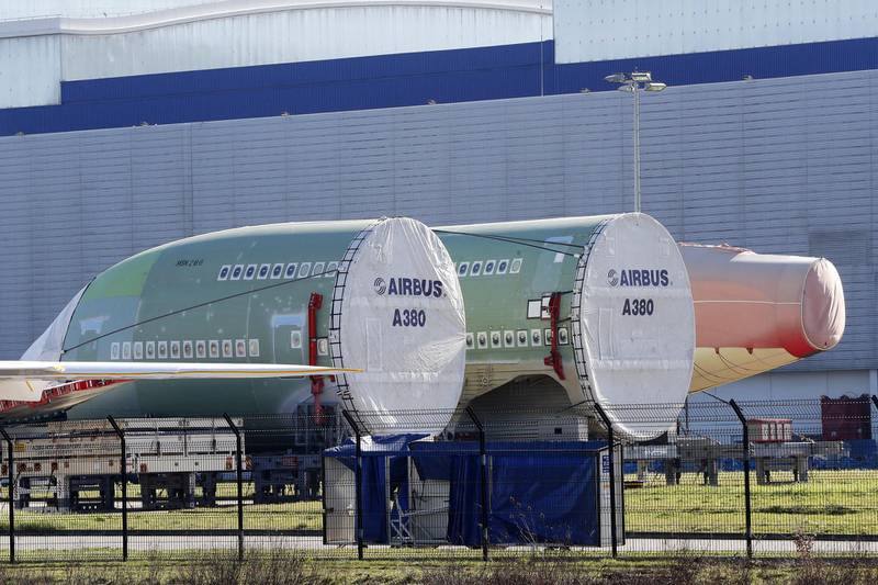 Parts of Airbus A380 airplanes are stocked at the Airbus plant.  EPA