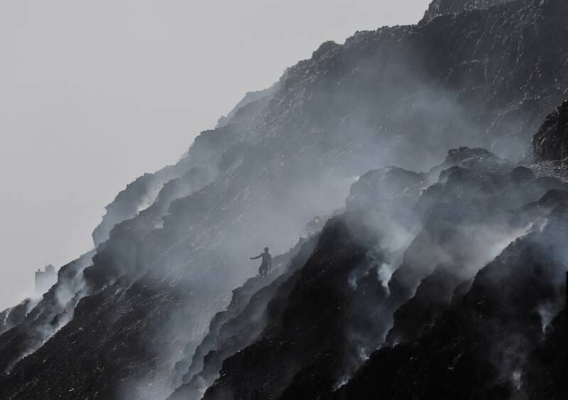Mountains of smouldering rubbish at the Bhalswa landfill in New Delhi, India. Reuters