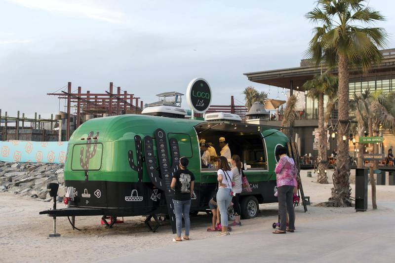 DUBAI, UNITED ARAB EMIRATES - NOV 21:

Loca Lito food truck at La Mer.

La Mer, a beachfront development in Jumeirah 1 by Meeras, covers 1.24 million square metres of existing and reclaimed land taken over by sprawling timber walkways and beachside promenades packed with restaurants.

(Photo by Reem Mohammed/The National)

Reporter:  HALA KHALAF
Section: WK