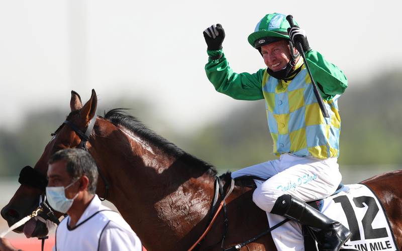 Jockey Tadhg O'Shea on Secret Ambition celebrates after winning the Godolphin Mile at the Dubai World Cup. EPA