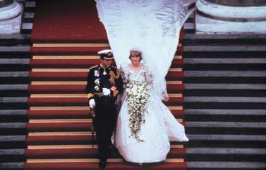 LONDON, ENGLAND - JULY 29: Prince Charles, Prince of Wales and Diana, Princess of Wales, wearing a wedding dress designed by David and Elizabeth Emanuel and the Spencer family Tiara, leave St. Paul's Cathedral following their wedding on July 29, 1981 in London, England. (Photo by Anwar Hussein/Getty Images)