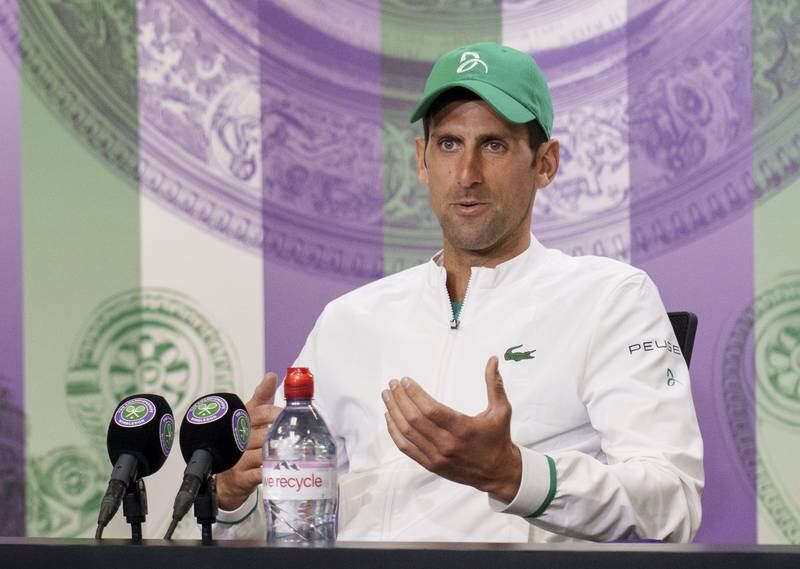 Novak Djokovic attends a press conference.