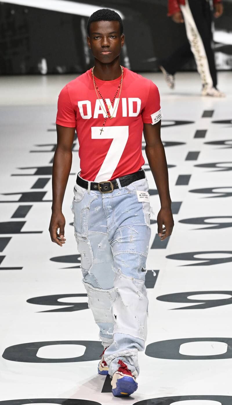 The Dolce & Gabbana spring/summer 2023 menswear collection gives a nod to David Beckham, with the footballer's Manchester United number appearing on a T-Shirt. Photo: EPA
