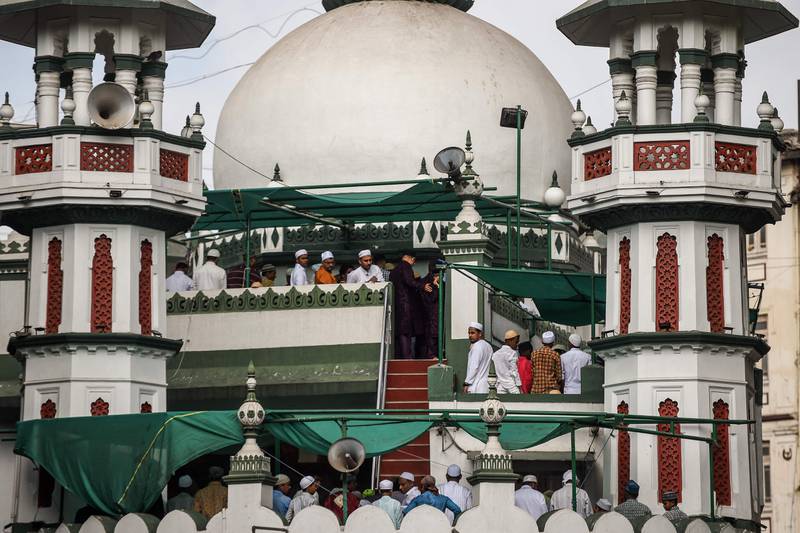 Worshippers offer morning prayers to start Eid Fitr at the Gol Masjid mosque in Mumbai.  AFP