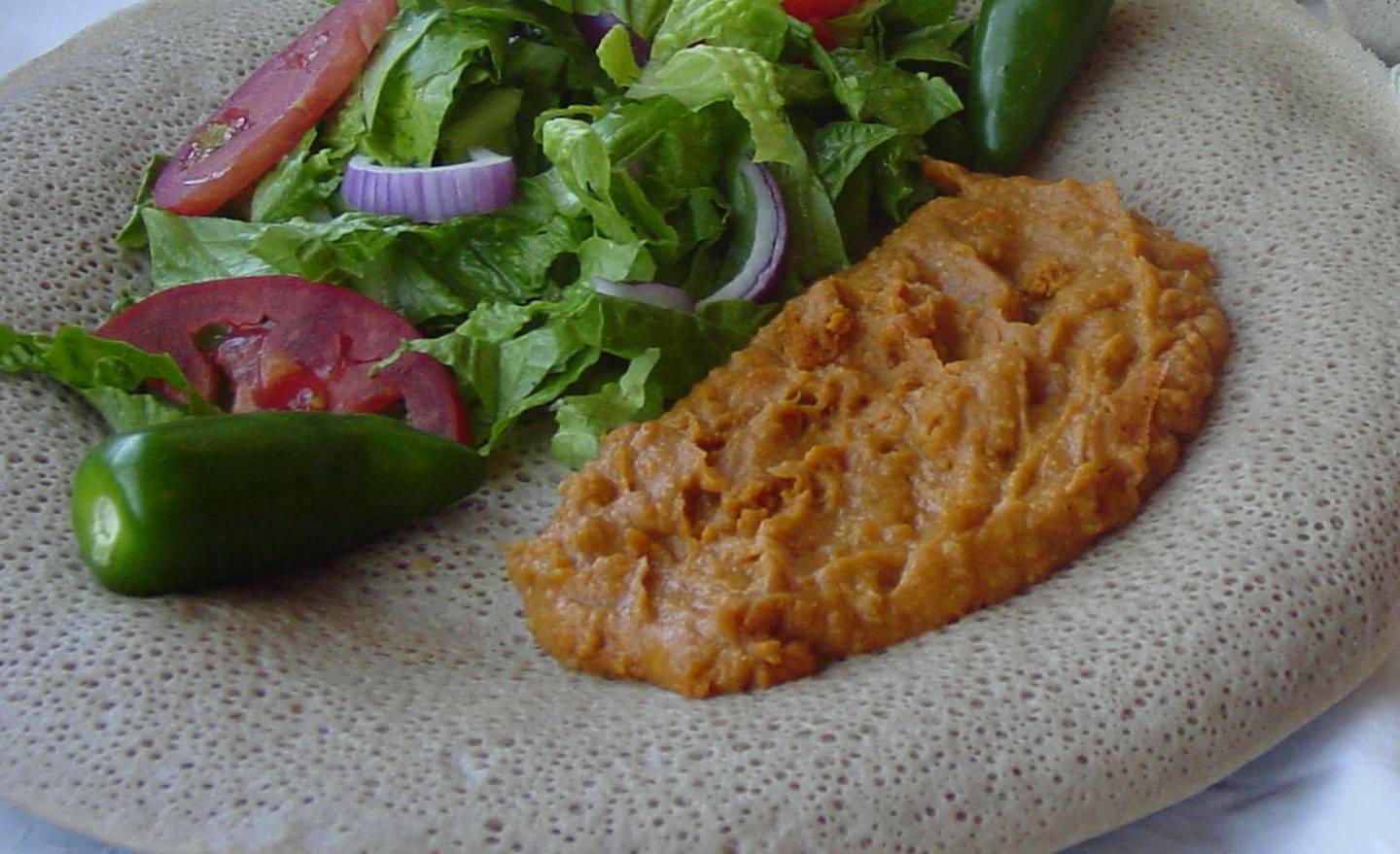 Shiro and salad. Photo: Wikimedia Commons