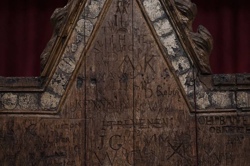 Much of the graffiti on the inside of the chair’s back rest was carved by Westminster schoolboys and visitors to Westminster Abbey during the 18th and 19th centuries