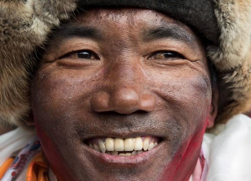 Nepalese veteran mountaineer Kami Rita Sherpa, 48, looks on after arriving from Everest Base camp.  Narendra Shrestha / EPA