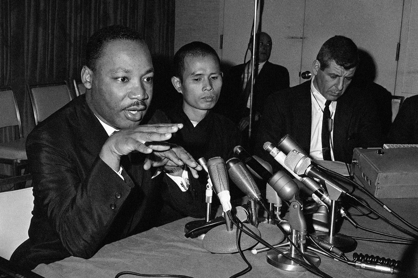 Martin Luther King, Jr, left, appearing in a Chicago news conference with Thich Nhat Hanh, a Buddhist monk from Vietnam, on May 31, 1966. AP