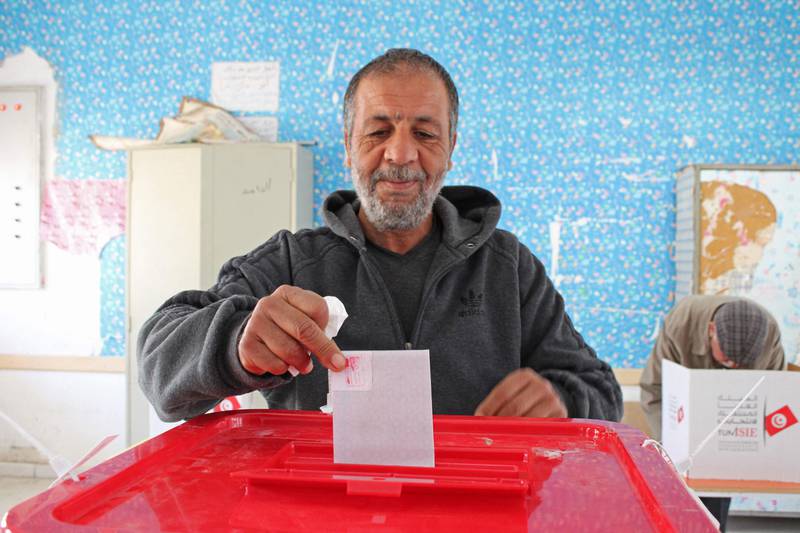 A Tunisian voter casts his ballot in Kasserine. AFP