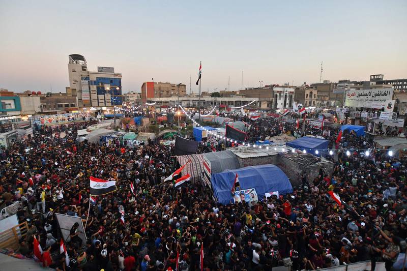 Iraqi protesters start an indefinite sit-in at al-Haboubi Square in the southern city of Nasiriyah in Dhi Qar province during the first anniversary of a mass anti-government movement. AFP