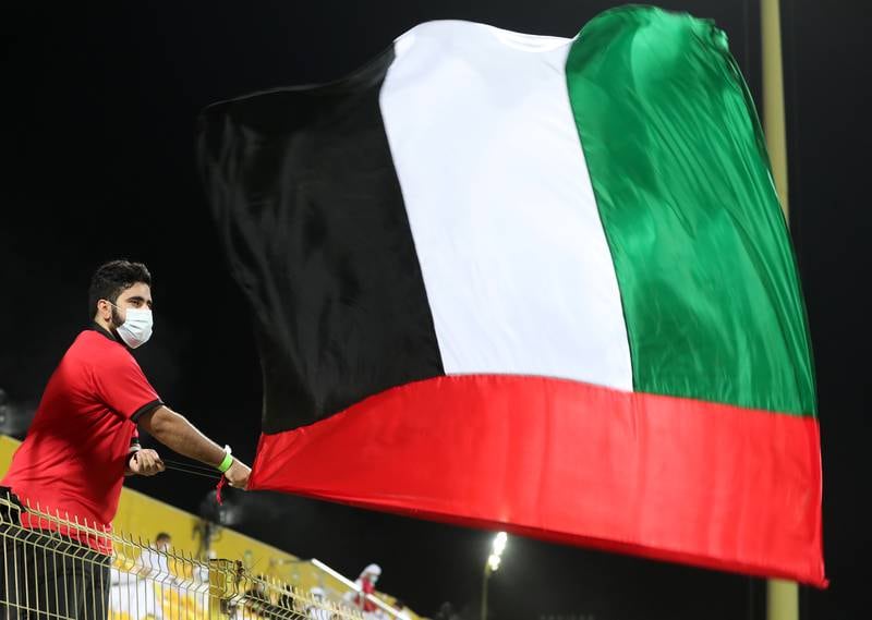 UAE fans prepare for the World Cup qualifier in Dubai. Chris Whiteoak / The National