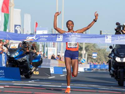 ABU DHABI, UNITED ARAB EMIRATES- Winner for women’s division Yashaneh finishing the race at the ADNOC ABU Abu Dhabi Marathon.  Leslie Pableo for The National 
