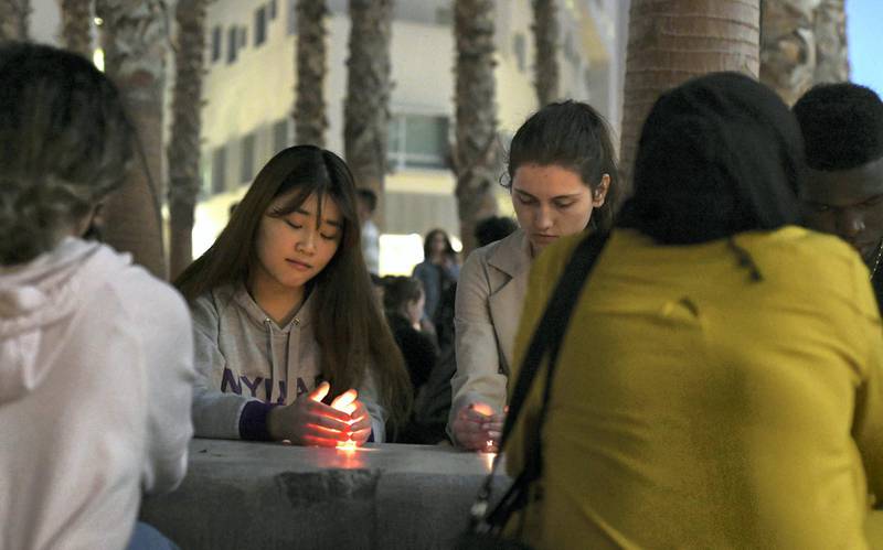 Abu Dhabi, United Arab Emirates - Students at the candlelight vigil for the devastating attacks in Christ Church, New Zealand at New York University, Saadiyat. Khushnum Bhandari for The National