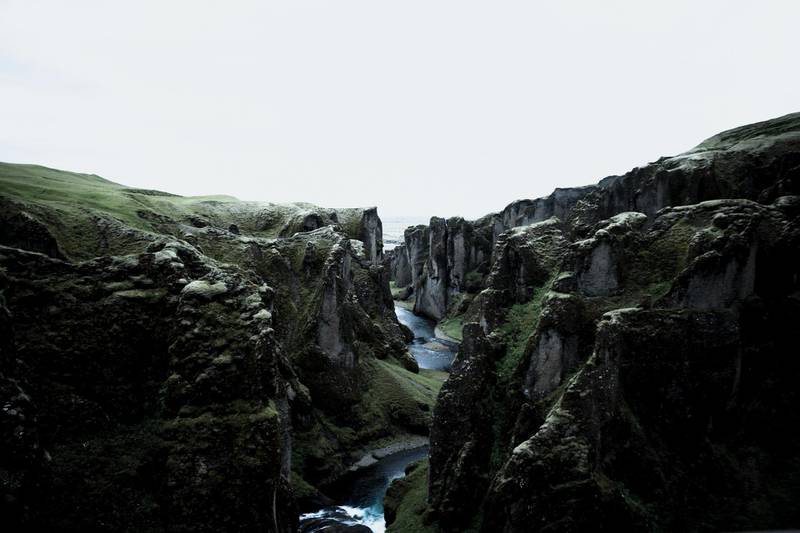 Fjaðrárgljúfur, a canyon in south-east Iceland, which is up to 100m deep and about 2km long. Black Tomato