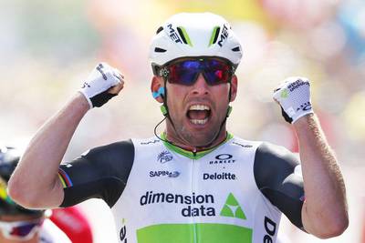 British sprinter Mark Cavendish crosses the finish line to win the first stage of the Tour de France first stage of the Tour de France cycling race from Mont Saint-Michel to Utah Beach, France, Saturday, July 2, 2016. Peter Dejong / AP Photo