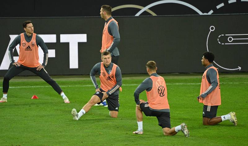 Julian Draxler, Toni Kroos, Niklas Suele, Joshua Kimmich and Serge Gnabry (L-R) take part in a training session. AFP
