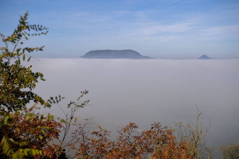 Mount Badacsony rises from a sea of fog over Lake Balaton, Hungary. EPA