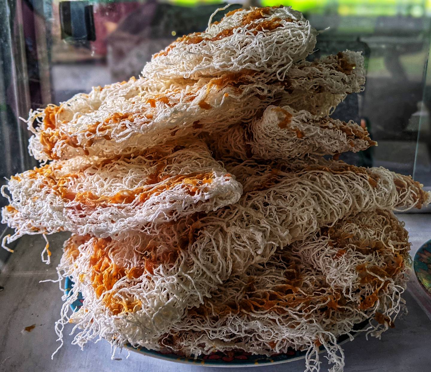 Aasmi, a deep-fried sweet of rice flour and coconut milk, is hard to find in restaurants outside Hela Bojun Hala. Photo: Meenakshi J