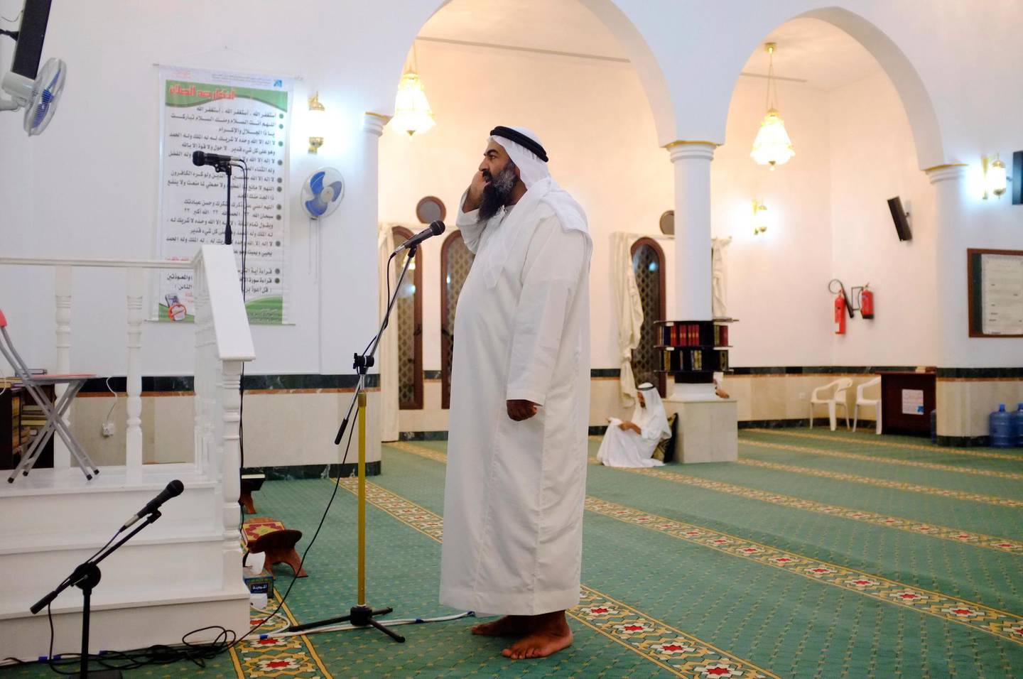 August 21. Emirate, Ahmed Al Hashemi does the call to prayer at the Sheikh Rashid bin Saeed Al Maktoum Mosque situated in one of the newly constructed neigbourhoods in Hatta. August 21, Dubai. United Arab Emirates (Photo: Antonie Robertson/The National)