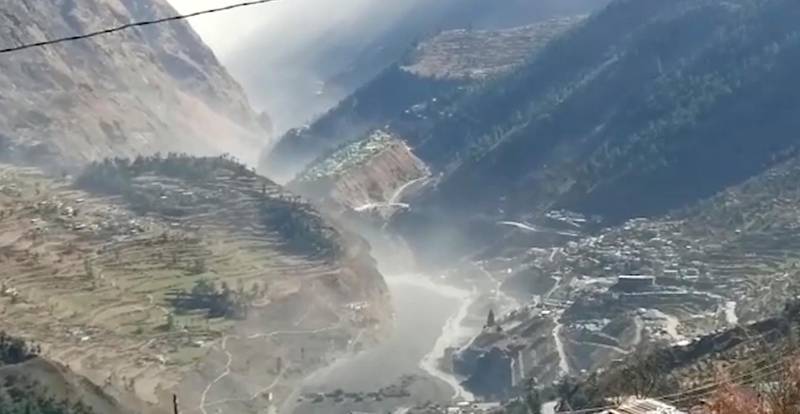 This still image from a video provided by KK Productions shows a flash flood in the Chamoli District after a portion of the Nanda Devi glacier collapsed in the Tapovan area of the northern state of Uttarakhand, India. AP