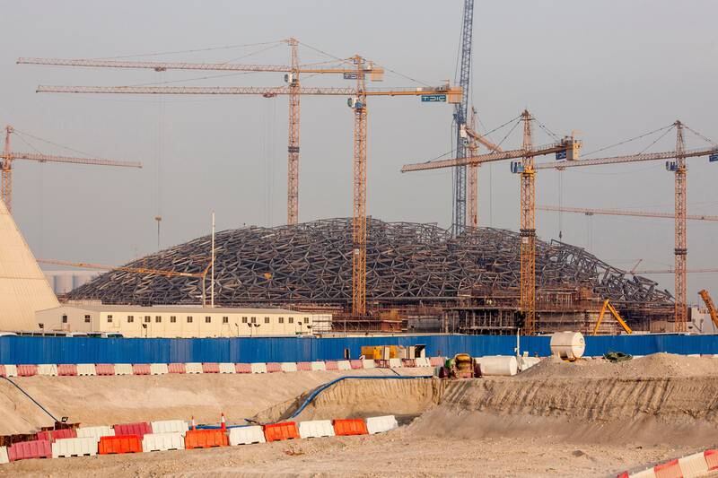 Louvre Abu Dhabi under construction in July 2014. Antonie Robertson / The National