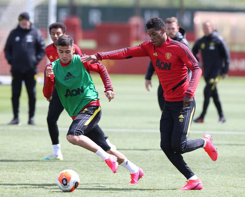 MANCHESTER, ENGLAND - JUNE 05: Andreas Pereira and Marcus Rashford of Manchester United in action during a first team training session at Aon Training Complex on June 05, 2020 in Manchester, England. (Photo by Matthew Peters/Manchester United via Getty Images)