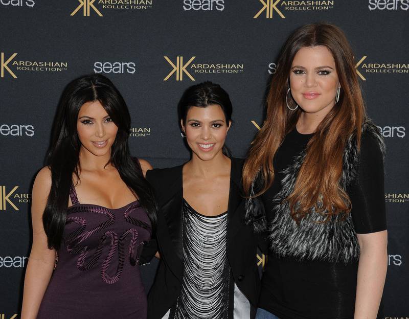(L-R) Kim Kardashian, Kourtney Kardashian and Khloe Kardashian promote the "Kardashian Kollection"  at Sears Cerritos on September 18, 2011 in Cerritos, California.