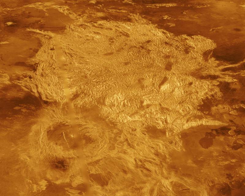 A portion of Alpha Regio is displayed in this three-dimensional perspective view of the surface of Venus from Nasa's Magellan spacecraft. In 1963, Alpha Regio was the first feature on Venus to be identified from an Earth-based radar.