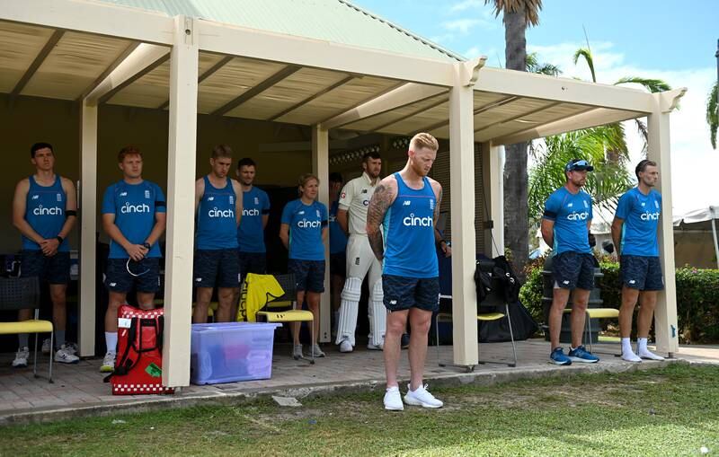 England players and staff stand for a moment's silence in memory of Australian cricketer Shane Warne. Getty
