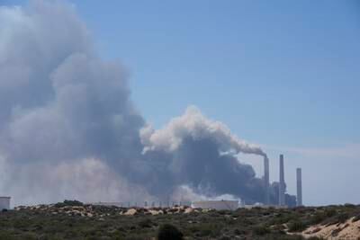 Smoke rises from an area near a power plant outside Ashkelon, Israel. AP 