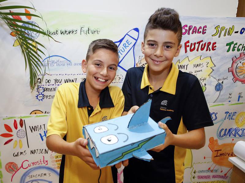 From left, Gems National Academy pupils Jad and Ryan, both 11, at the What Works Future initiative on Monday, part of Dubai’s Knowledge and Human Development Authority’s overall plan to provide a more complete education.  Chris Whiteoak for The National