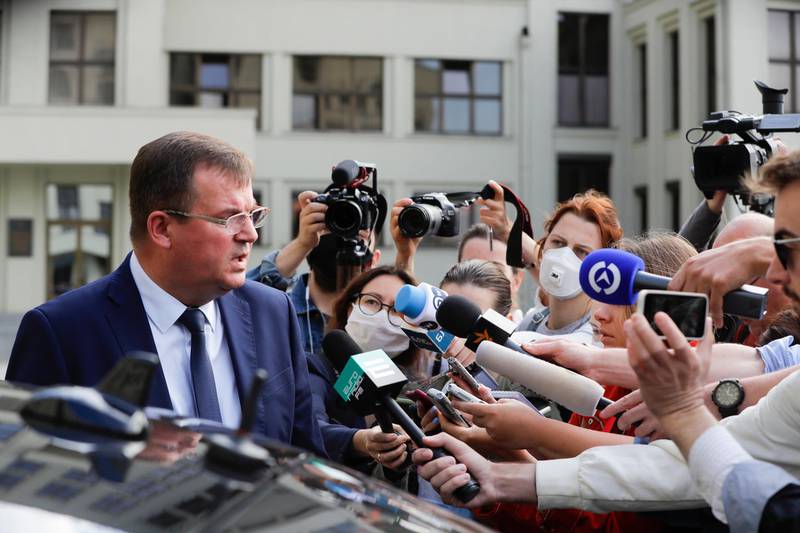 Andrei Ravkov, the head of State Secretary of the Security Council of Belarus, speaks reporters after the arrests. AP