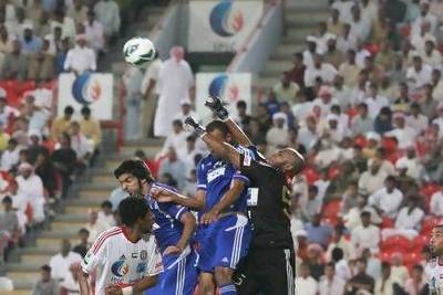Ali Kasheif, right, punches the ball clear during a Pro League match for Al Jazira against Al Nasr earlier this season. Lee Hoagland / The National