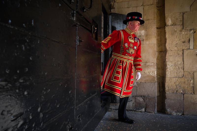 LONDON, ENGLAND - JULY 10: Chief Yeoman Warder, Pete McGowran checks on the area around the Middle Tower ahead of a ceremonial event to mark the reopening to the public of the Tower of London on July 10, 2020 in London, England. As the British Government continues to relax the Coronavirus restrictions, tourism hotspots such as the Tower of London are re-opening their doors, hoping to draw in visitors on the opportunity to see the sights during these much quieter times. (Photo by Leon Neal/Getty Images)