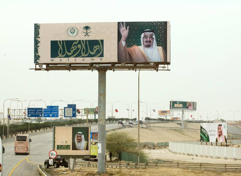 Billboards with photos of Saudi King Salman and Arabic that reads, "welcome" line the road to the convention centre where Arab leaders are meeting for an Arab summit in Dhahran, Saudi Arabia, on April 15, 2018. Amr Nabil / AP Photo