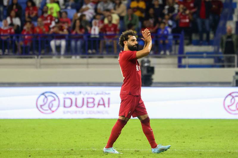 Liverpool striker Mohamed Salah greets supporters in Dubai. AFP