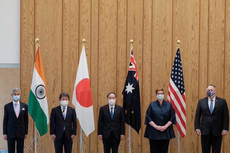 India's Foreign Minister Subrahmanyam Jaishankar, Japan's counterpart Toshimitsu Motegi, Japan's Prime Minister Yoshihide Suga, Australian Foreign Minister Marise Payne and U.S. Secretary of State Mike Pompeo pose for a picture before the meeting at the prime miniter's office in Tokyo, Japan October 6, 2020.  Nicolas Datiche/Pool via REUTERS