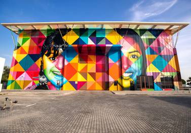 Abu Dhabi, United Arab Emirates, December 14, 2019. -- STORY BRIEF: DMT AbuDhabi is launching a street art initiative, commissioning artists around theworld to create murals across the city. The first to complete hisartwork/project is Brazilian artist Kobra – he will unveil his large-scale workon Saturday along with the chairman of DMT. -- Kobra with Mohamed Al Khadar Al Ahmed, Ecercutive Director of Strategic Affairs, Department of Municipalities and Transport, Abu Dhabi. Section: A&L Reporter: Alexandra Chaves
